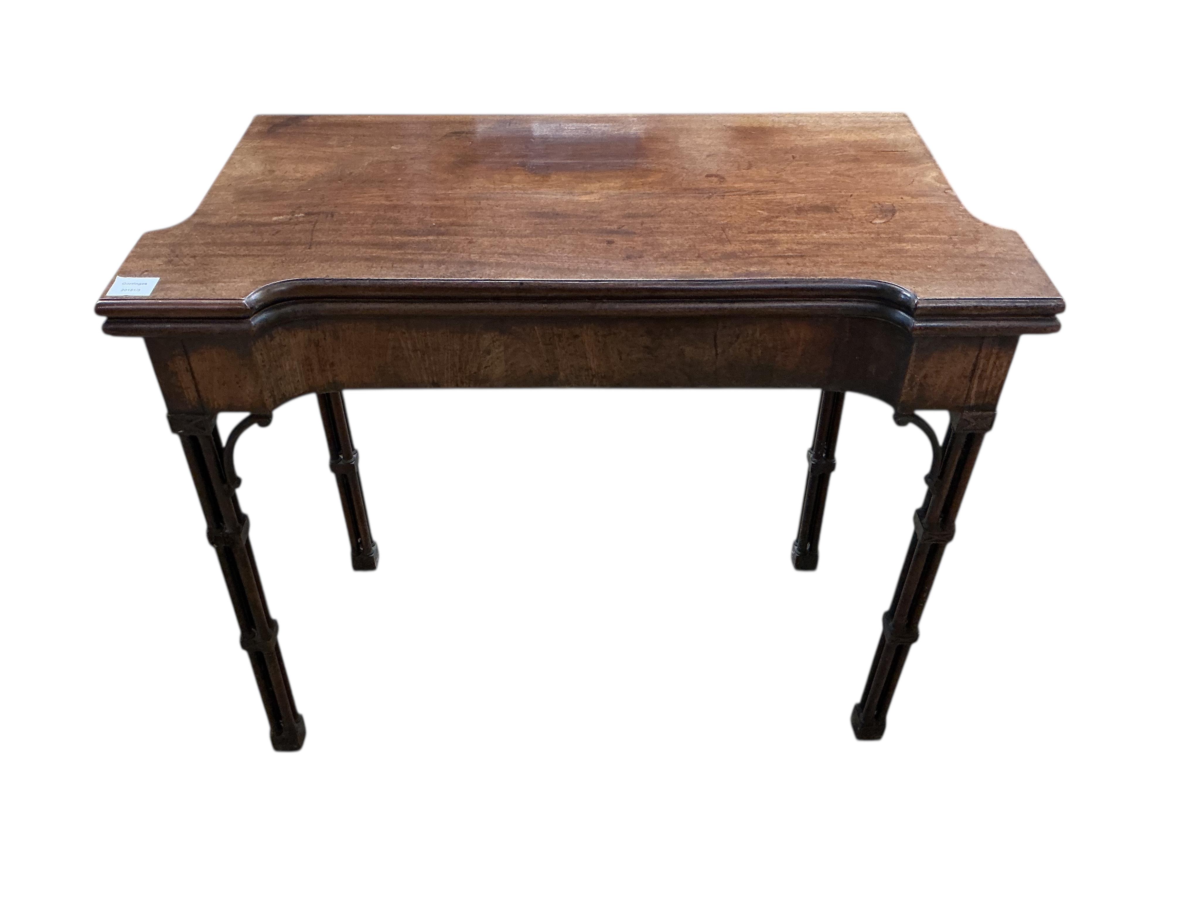 A George III Chippendale style mahogany folding card table on cluster column legs, width 90cm, depth 45cm, height 74cm